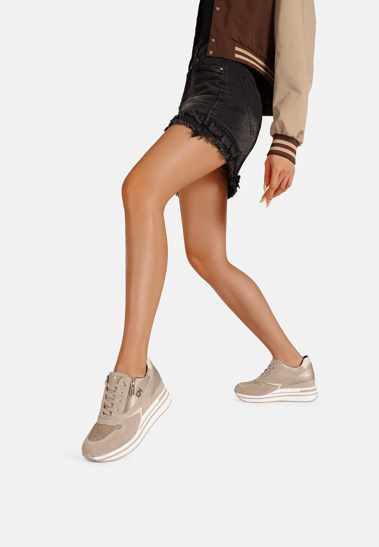 Sneakers in vera pelle con platform QH8013