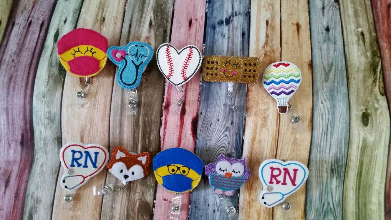 Surgeon with Face Mask Badge Reel....Retractable Badge Reel...Made with Vinyl and Felt and Embroidered...Durable...Uniform